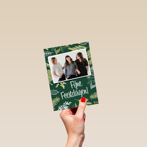 kerst zakelijk fotokaart met bladeren op groen