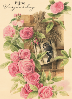 vogel in vogelhuisje tussen rozen