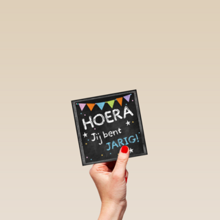 schoolbord met feestslinger
