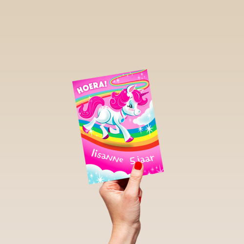 hoera een eenhoorn op een regenboog