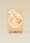een babybeer in doek