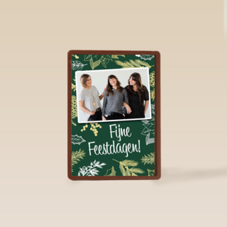 kerst zakelijk fotokaart met bladeren op groen