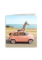 giraf in kleine auto