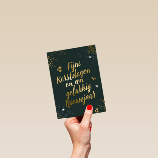 kerstkaart met gouden tekst op groen
