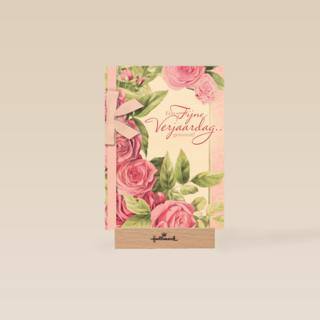roze rozen met strik