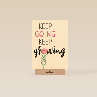 roze bloemetje met quote