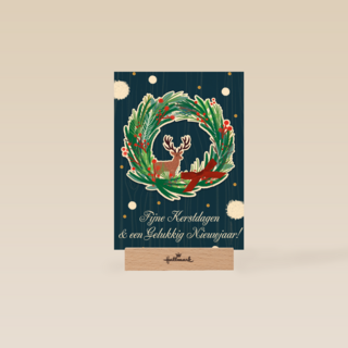 Blauwe kerstkaart kerstkrans rendier