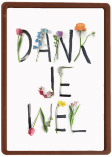 botanical kaart met bloemenletters geschreven dankjewel