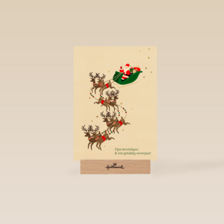 zakelijke kerstkaart met kerstman en rendieren