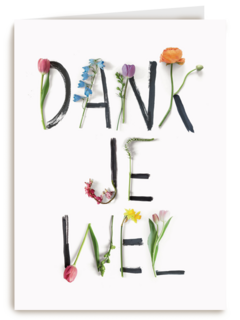 botanical kaart met bloemenletters geschreven dankjewel