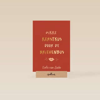 Dikke kerstkus brievenbus