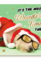 hond verkleed als kerstman met champagnefles