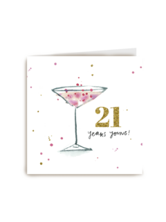 21 years young with a pink cocktail