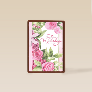 roze rozen met strik