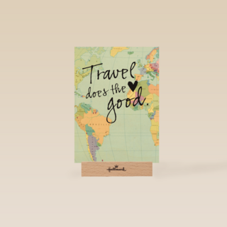 reizen kaart met de tekst travel does the heart good